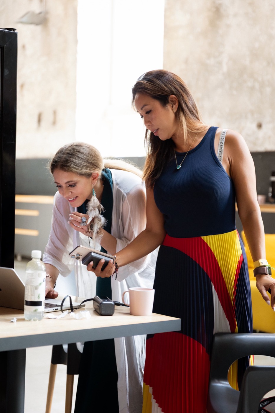 Sabrina Stocker beside a founder at the end of their build
